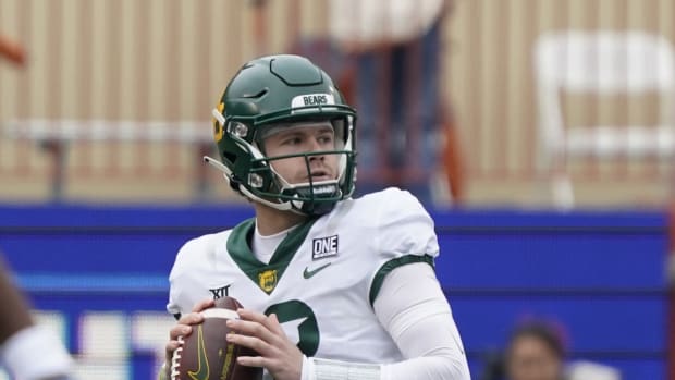 Nov 25, 2022; Austin, Texas, USA; Baylor Bears quarterback Blake Shapen (12) looks throw a pass during the first half against the Texas Longhorns at Darrell K Royal-Texas Memorial Stadium.